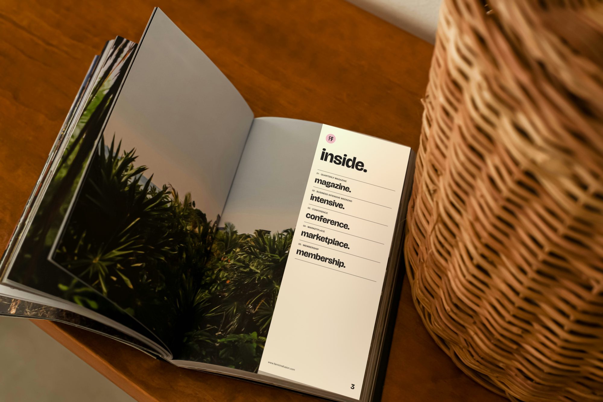 The magazine open on a wooden table: a full-page photograph on the left, the contents page inside. on the right with the five formats