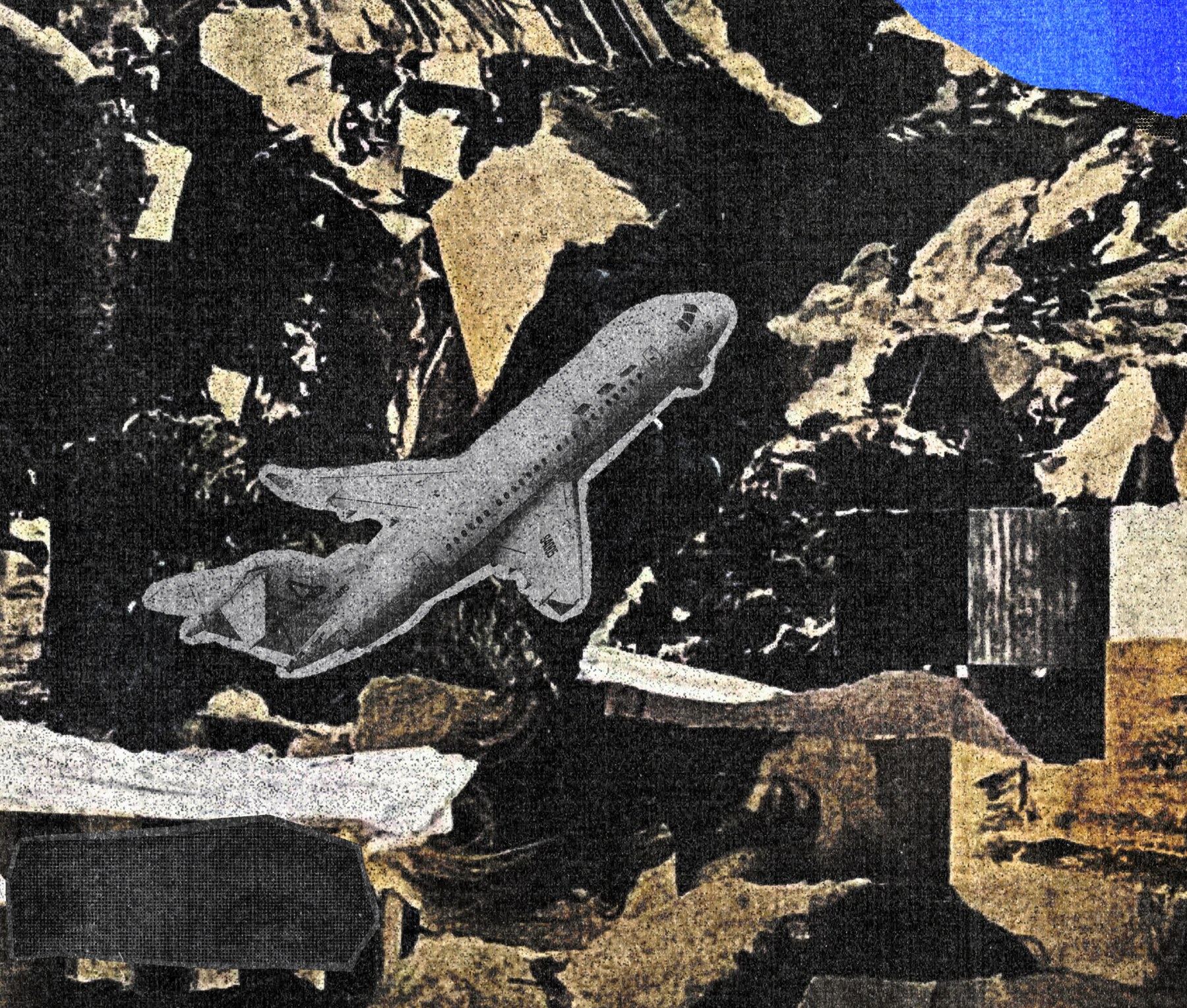 Close-up: a paper plane cut from a magazine among torn scraps