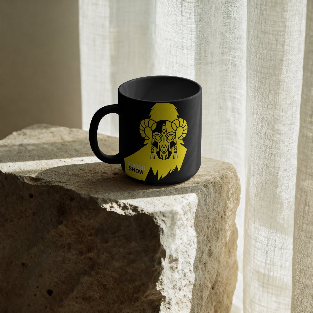The black mug with the yellow mask